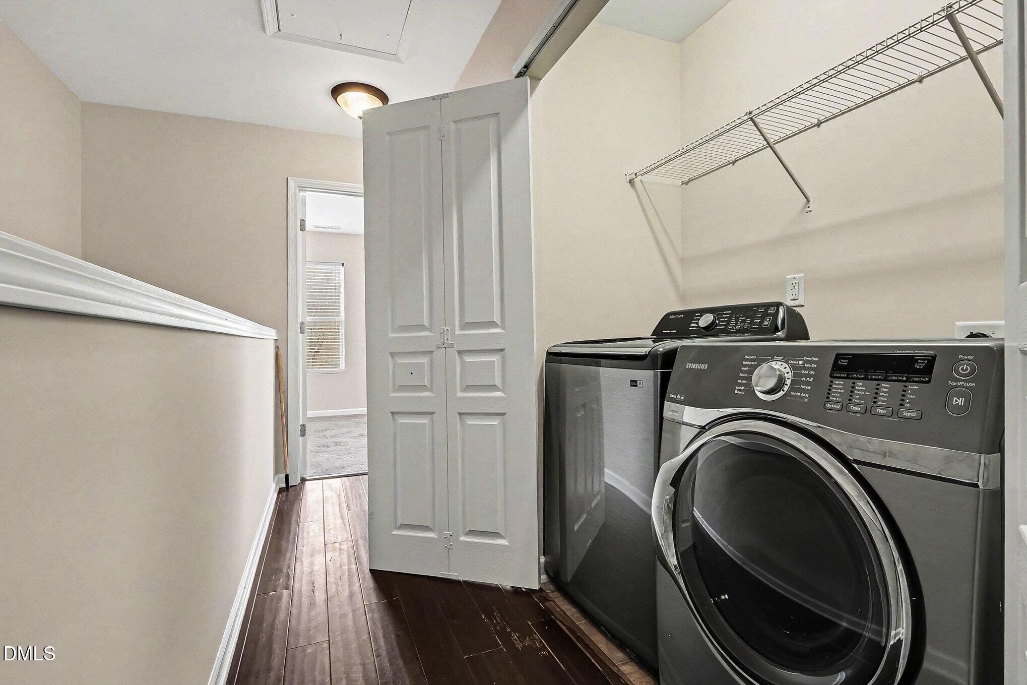 2905 Berkeley Springs Place Raleigh, NC 27616 - Photo 10 of 20 a view of a hallway with washer and dryer