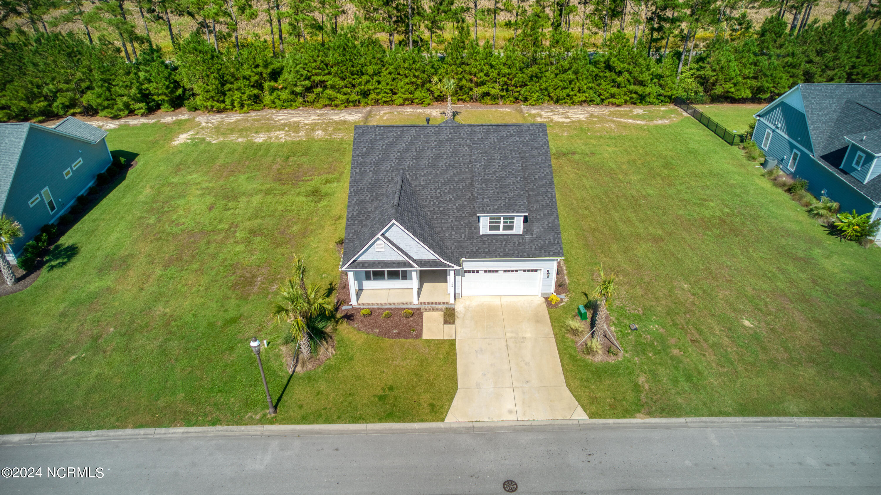 173 Twining Rose Lane Holly Ridge, NC 28445 - Photo 3 of 43 20241008-20241008-DJI_0670-2