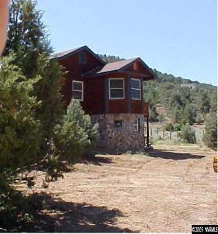 21361 Crestview Road Reno, NV 89521 - Photo 1 of 8 a front view of a house with a yard