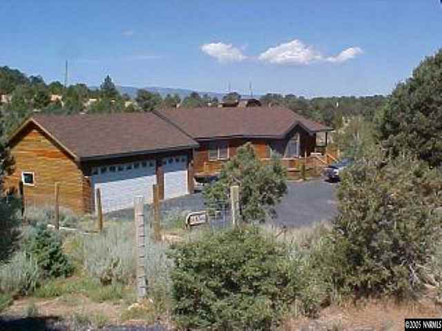 21361 Crestview Road Reno, NV 89521 - Photo 2 of 8 an aerial view of house with yard and seating space