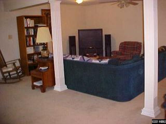 21361 Crestview Road Reno, NV 89521 - Photo 3 of 8 a room with a mirror and gym equipment
