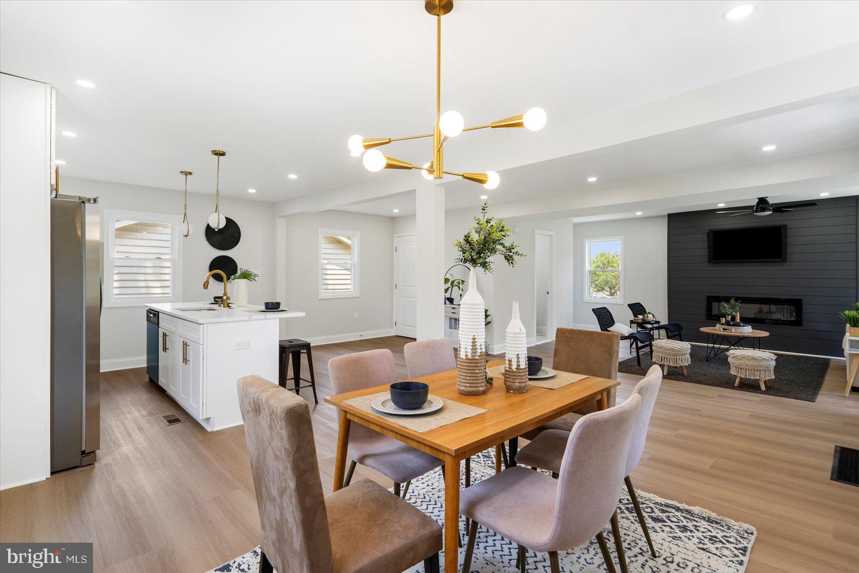 4810 Whitfield Chapel Road Lanham, MD 20706 - Photo 13 of 52 a view of a dining room with furniture and wooden floor