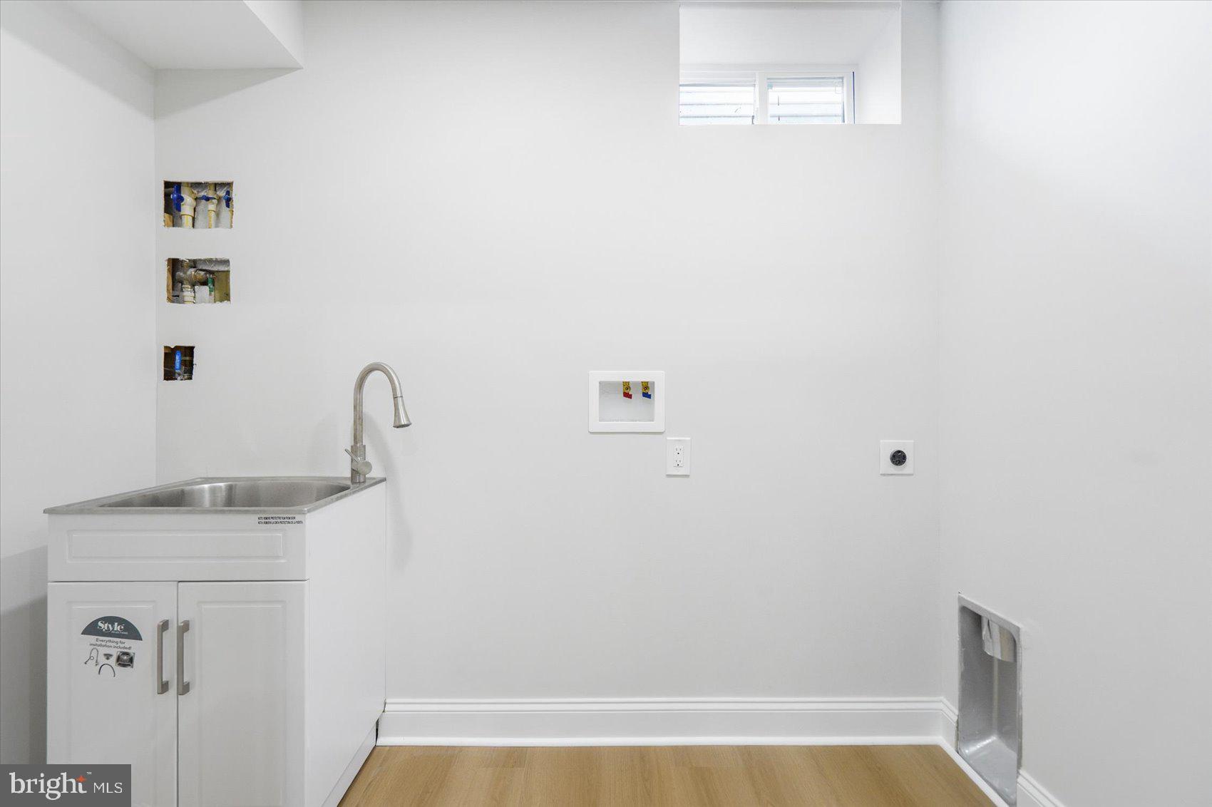 4810 Whitfield Chapel Road Lanham, MD 20706 - Photo 40 of 52 a bathroom with a sink