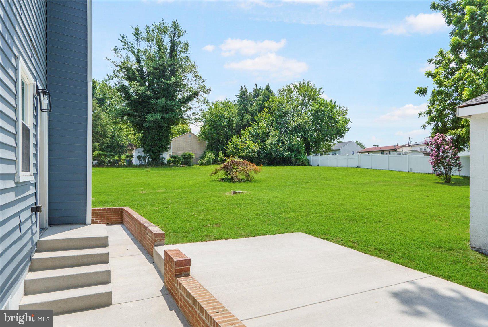 4810 Whitfield Chapel Road Lanham, MD 20706 - Photo 48 of 52 a view of a backyard with a garden