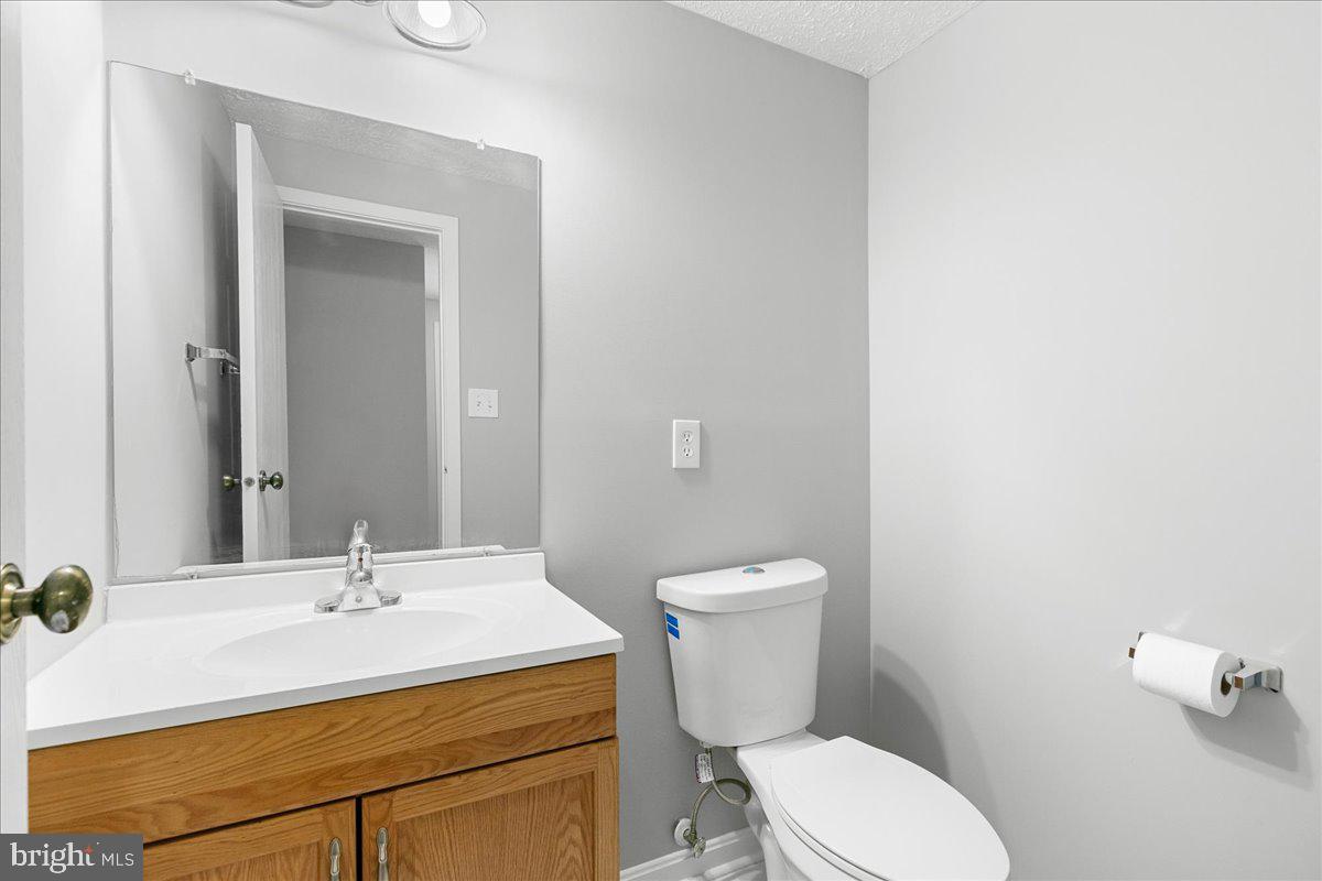 6522 Alexis Lane Springfield, VA 22152 - Photo 16 of 46 Half bath on main level