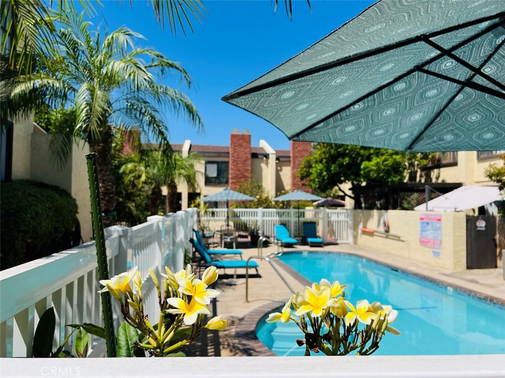 a view of a swimming pool with a patio