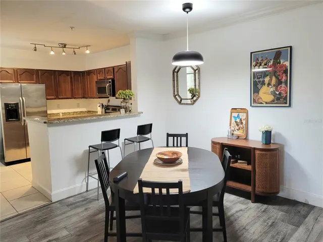 a view of a dining room with furniture