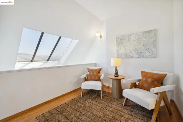 a workspace with furniture and window