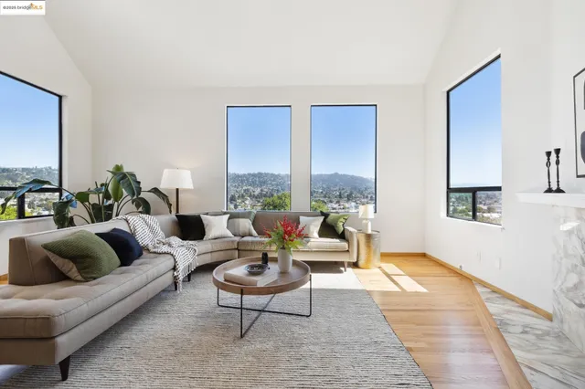 a living room with furniture and a rug