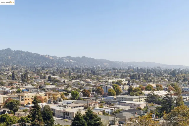 an aerial view of residential house and green space