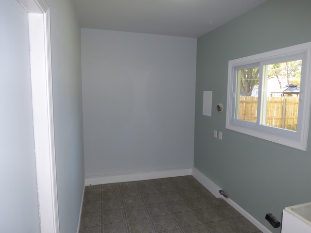 348 East Briarcliff Road Bolingbrook, IL 60440 - Photo 12 of 20 a view of an empty room with a window