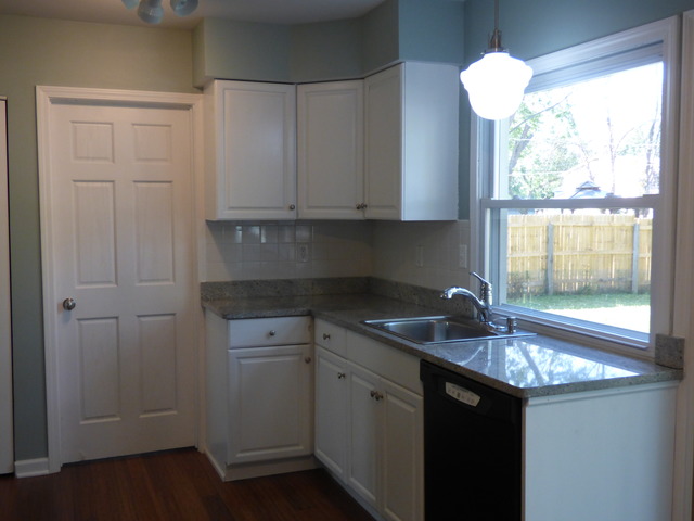 348 East Briarcliff Road Bolingbrook, IL 60440 - Photo 9 of 20 a kitchen with a sink cabinets and window