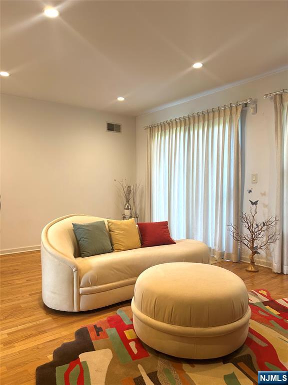 302 Grand Ridge Drive, Unit 302 Ridgefield, NJ 07657 - Photo 18 of 41 a living room with a couch and a table