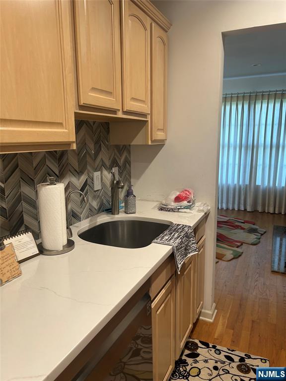 302 Grand Ridge Drive, Unit 302 Ridgefield, NJ 07657 - Photo 21 of 41 a kitchen with stainless steel appliances granite countertop a sink stove and cabinets