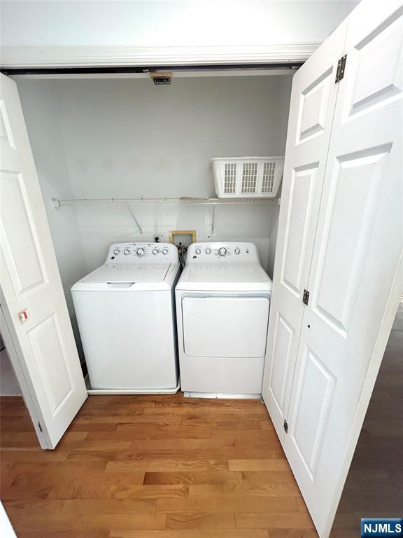 302 Grand Ridge Drive, Unit 302 Ridgefield, NJ 07657 - Photo 28 of 41 a utility room with dryer and washer