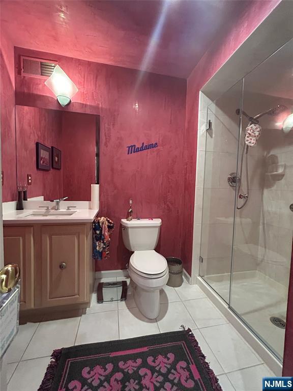 302 Grand Ridge Drive, Unit 302 Ridgefield, NJ 07657 - Photo 30 of 41 a bathroom with a sink toilet and shower