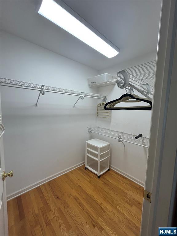 302 Grand Ridge Drive, Unit 302 Ridgefield, NJ 07657 - Photo 34 of 41 a view of a room with rack on the wall