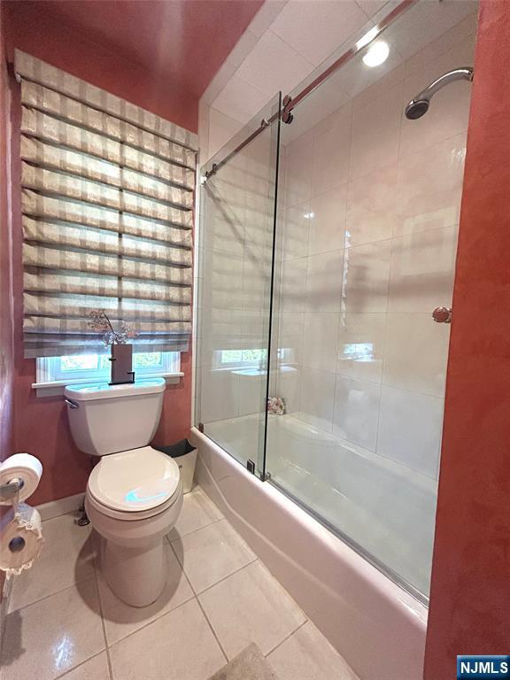 302 Grand Ridge Drive, Unit 302 Ridgefield, NJ 07657 - Photo 39 of 41 a bathroom with a toilet and a shower