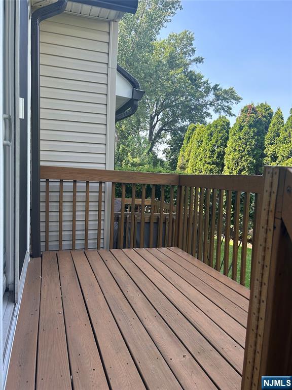 302 Grand Ridge Drive, Unit 302 Ridgefield, NJ 07657 - Photo 9 of 41 a view of balcony with wooden floor