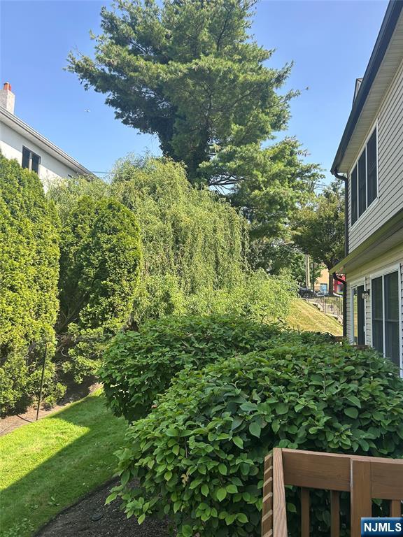 302 Grand Ridge Drive, Unit 302 Ridgefield, NJ 07657 - Photo 10 of 41 a view of a yard front of house
