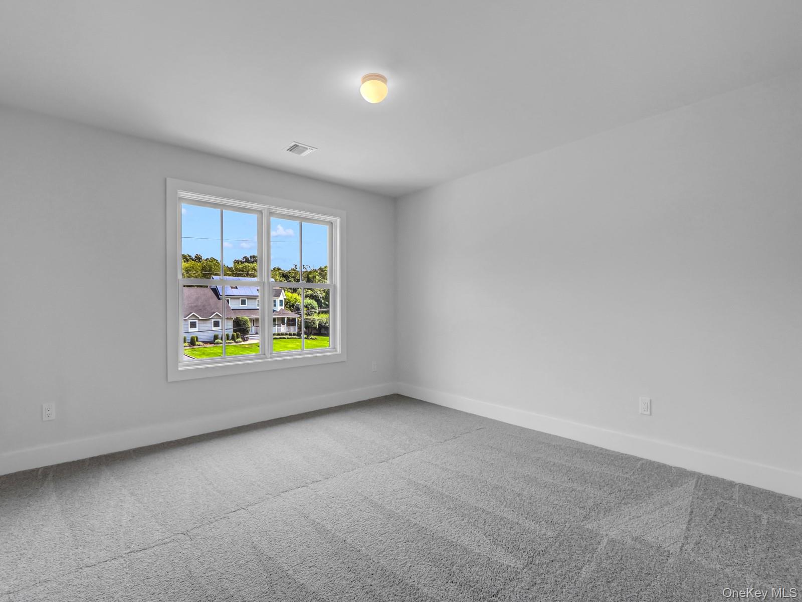 1 North Country Road Port Jefferson, NY 11777 - Photo 23 of 39 a view of an empty room with a window