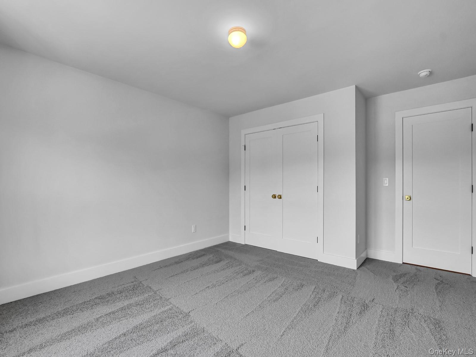 1 North Country Road Port Jefferson, NY 11777 - Photo 24 of 39 a view of empty room with wooden floor