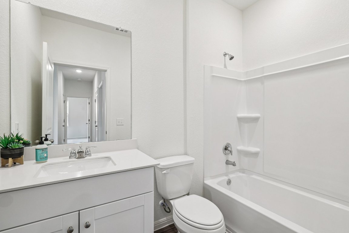 1516 Morris Loop San Marcos, TX 78666 - Photo 30 of 40 Full bathroom featuring shower / bath combination and vanity