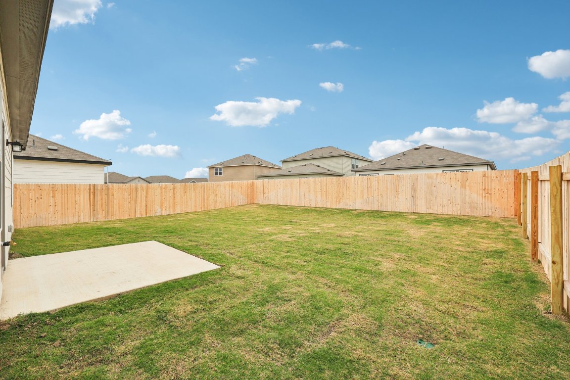 1516 Morris Loop San Marcos, TX 78666 - Photo 36 of 40 Fenced backyard featuring a patio and a residential view
