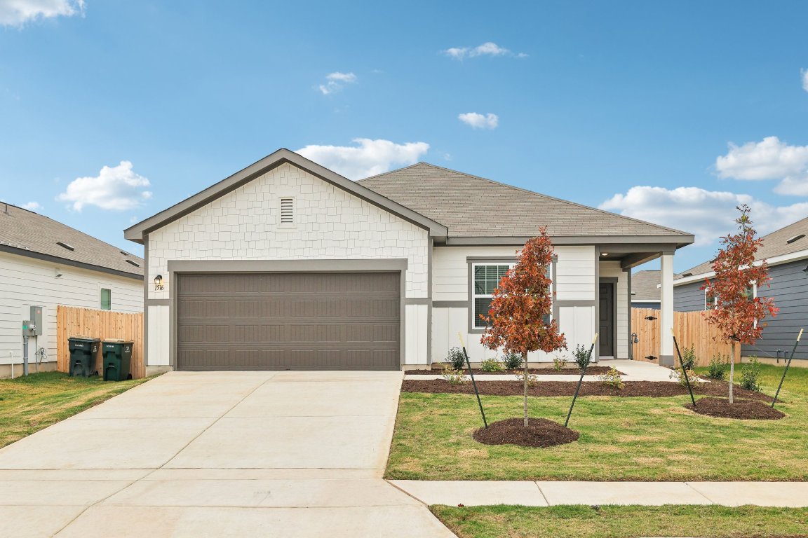 1516 Morris Loop San Marcos, TX 78666 - Photo 7 of 40 Ranch-style house with a garage and driveway