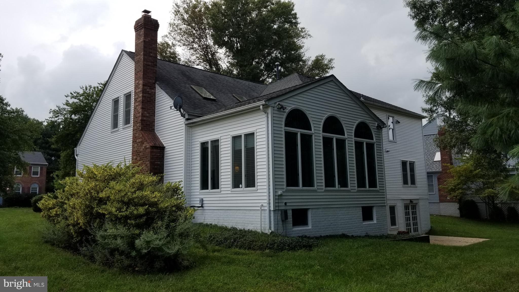 1507 Golf Course Drive Bowie, MD 20721 - Photo 3 of 37 Exterior (Rear) - storage room under sun room