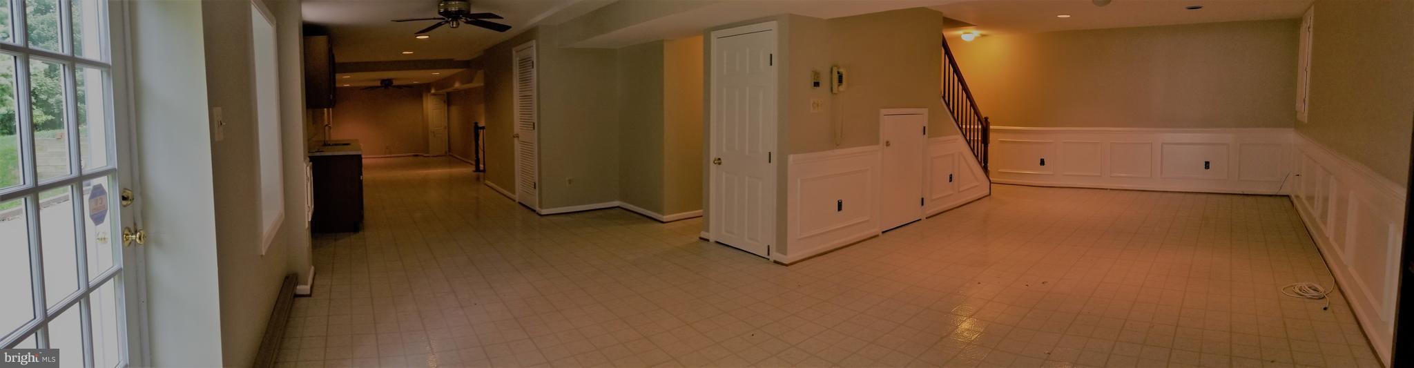1507 Golf Course Drive Bowie, MD 20721 - Photo 35 of 37 Basement-storage behind door; wet bar on left wall