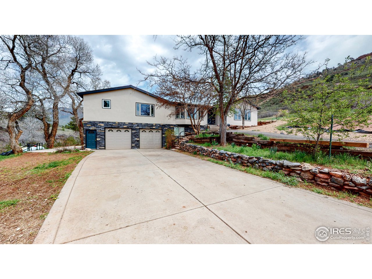1200 Ponderosa Hill Road Lyons, CO 80540 - Photo 4 of 40 a picture of a house with a outdoor space