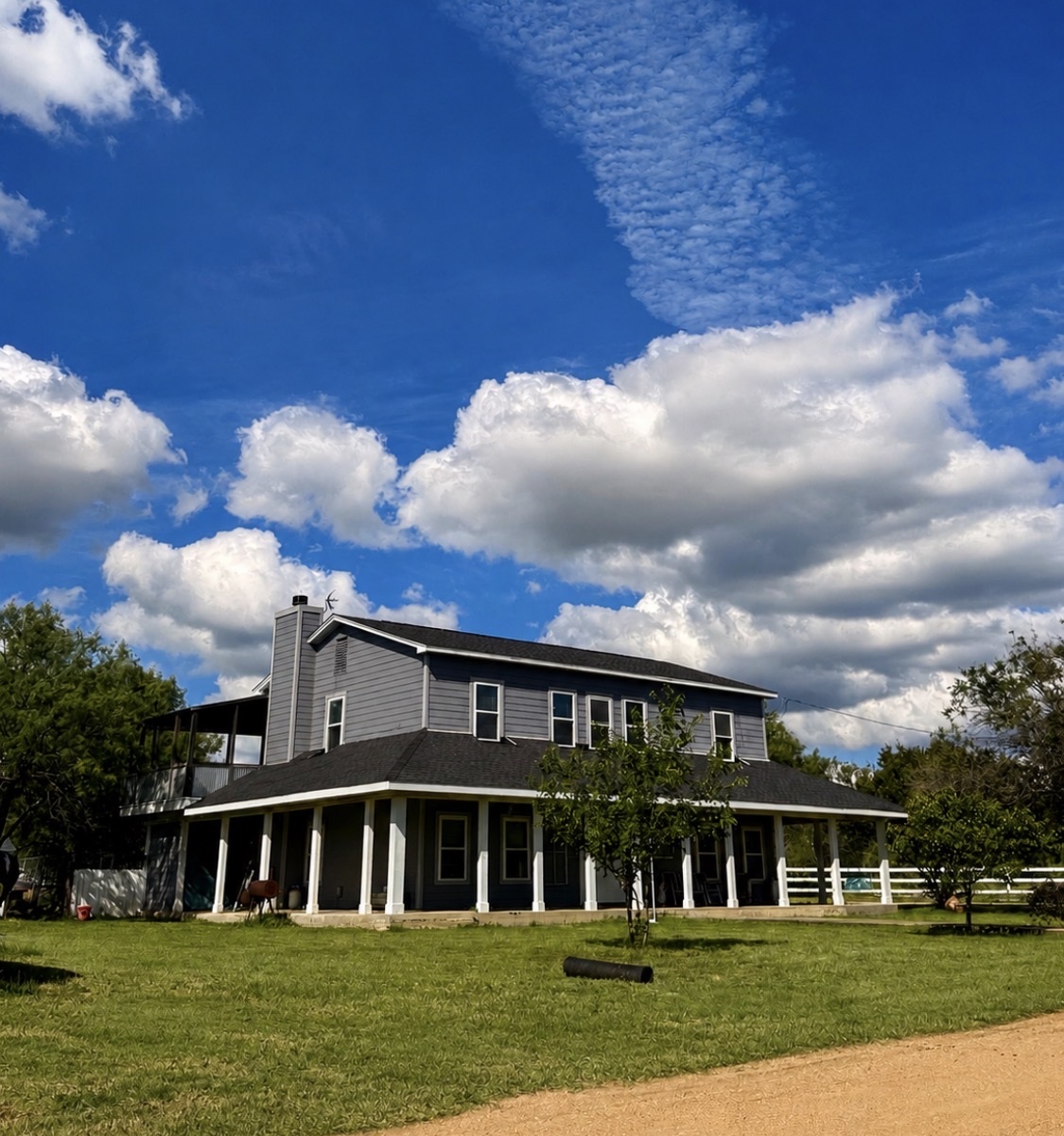 221 Winding Way Road Marble Falls, TX 78654 - Photo 1 of 12 A spacious home with a covered porch and expansive yard for peaceful country living. The porch is amazing!