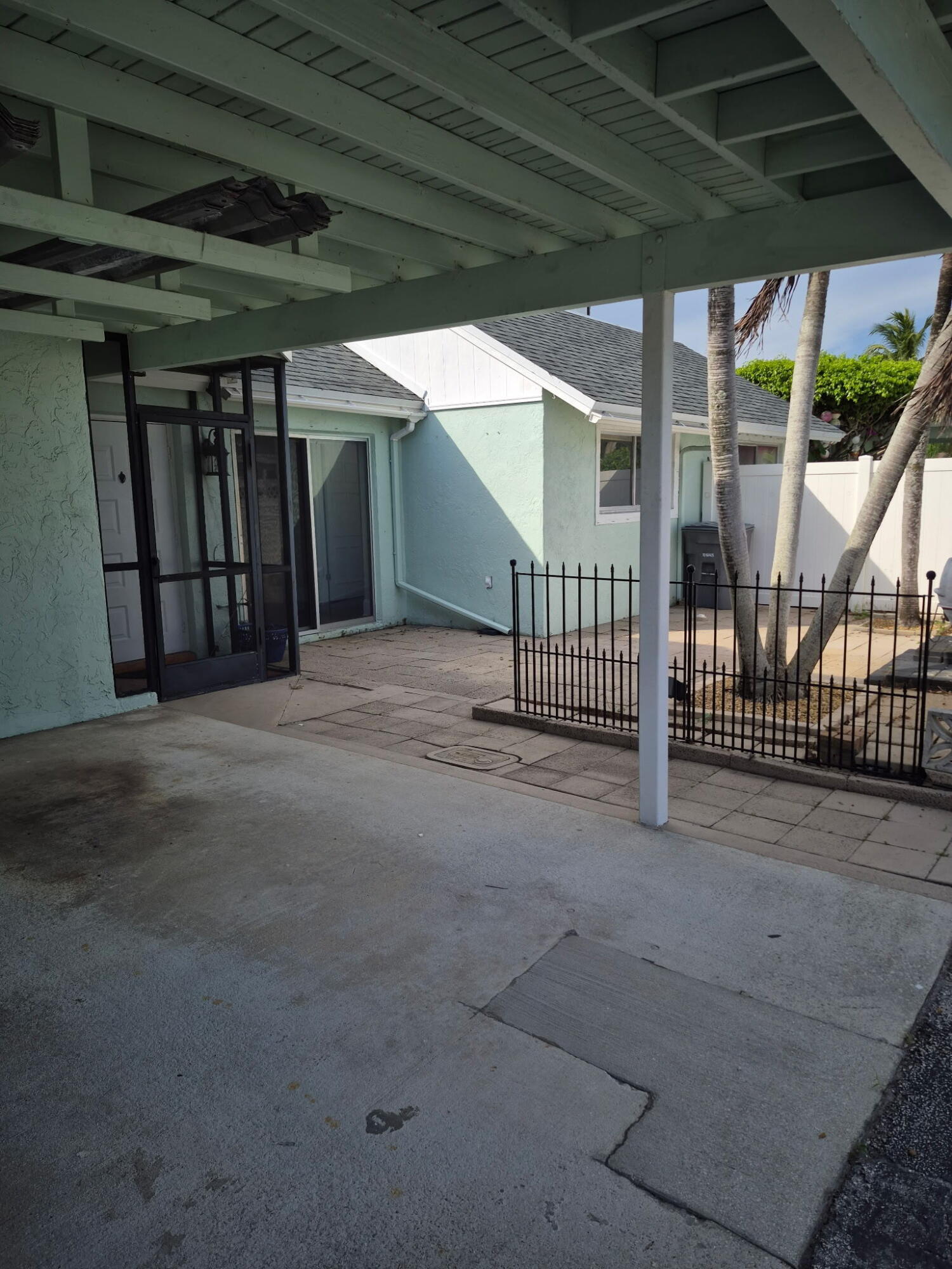 9253 Southwest 5th Street, Unit C Boca Raton, FL 33428 - Photo 3 of 22 Front Carport and Patio