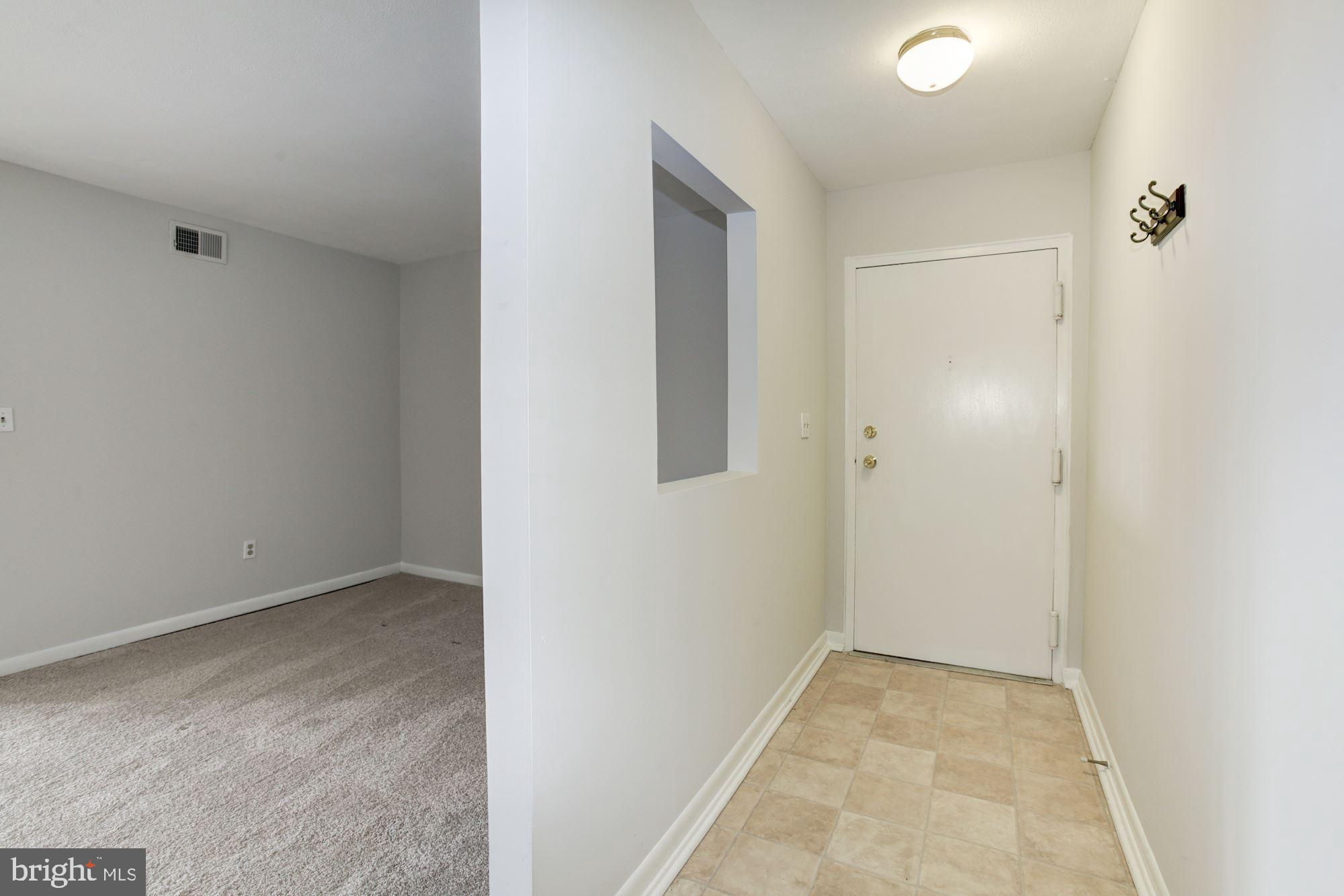 5860 Thunder Hill Road, Unit 2C Columbia, MD 21045 - Photo 4 of 22 Entry foyer