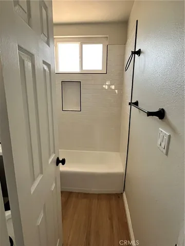 a bathroom with a bathtub