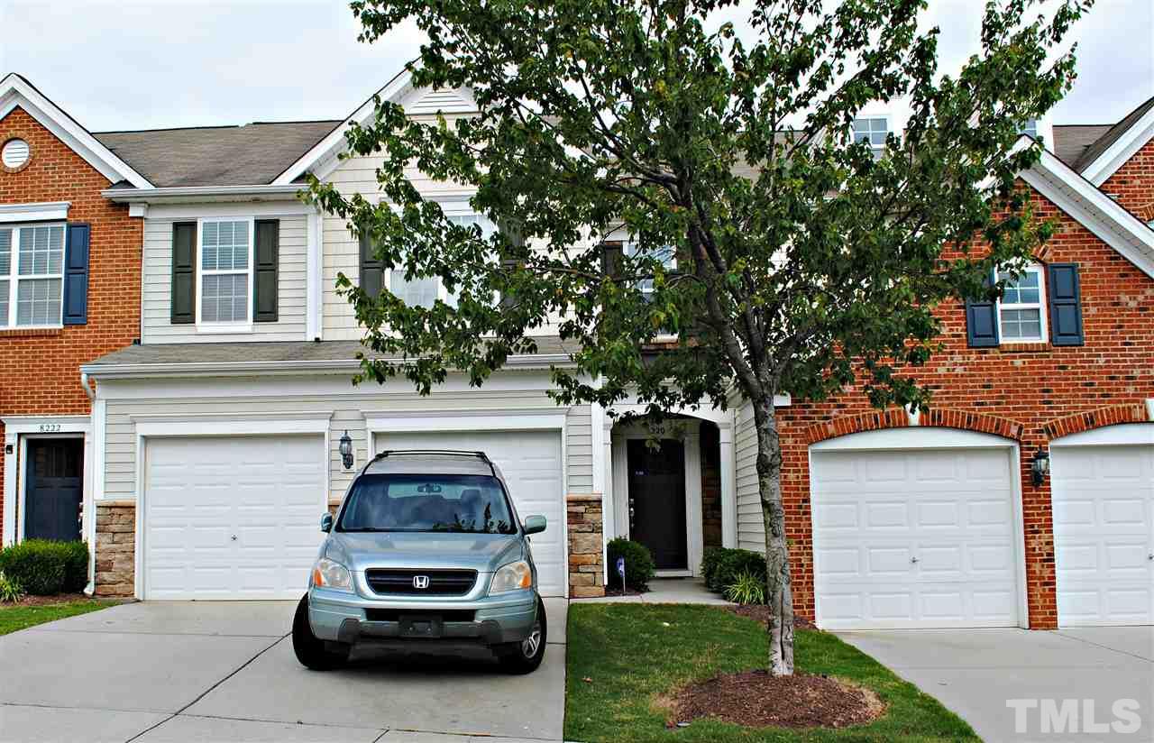 8220 Saltwood Place Raleigh, NC 27617 - Photo 1 of 15 a car parked in front of a house