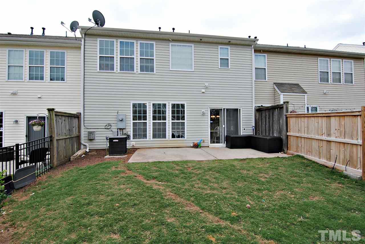 8220 Saltwood Place Raleigh, NC 27617 - Photo 12 of 15 a view of a house with a yard and front view of a house