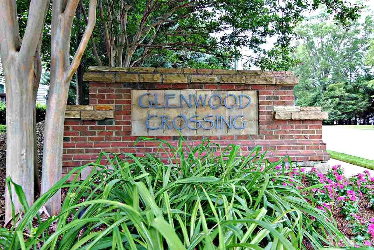 8220 Saltwood Place Raleigh, NC 27617 - Photo 15 of 15 a sign that is sitting in front of flowers