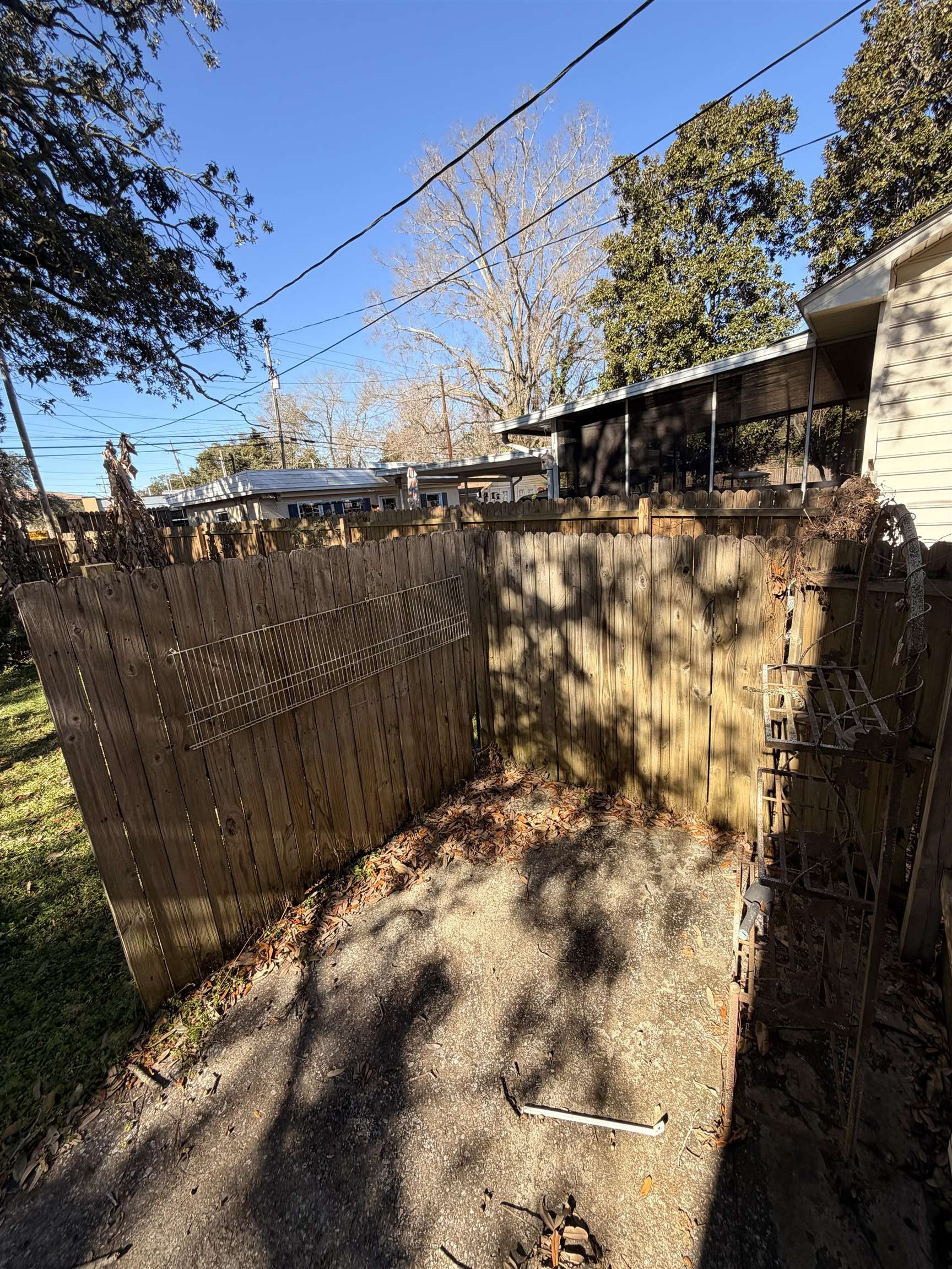 1111 Palmetto Street Georgetown, SC 29440 - Photo 31 of 36 Kitchen with a textured ceiling, light countertops, appliances with stainless steel finishes, a breakfast bar, and a peninsula