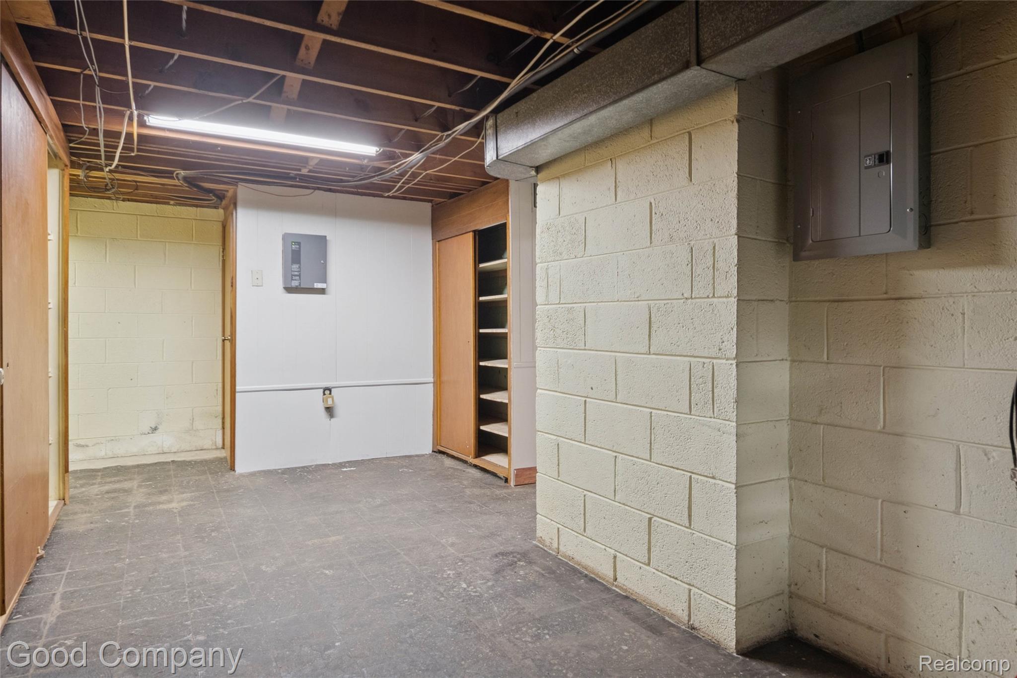 33920 Mulvey Road Fraser, MI 48026 - Photo 37 of 49 Basement featuring a gas fireplace and a drop ceiling