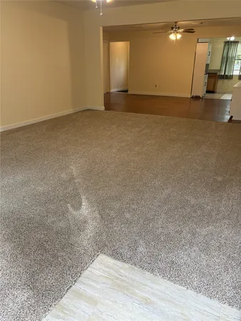 a view of a big room with wooden floor