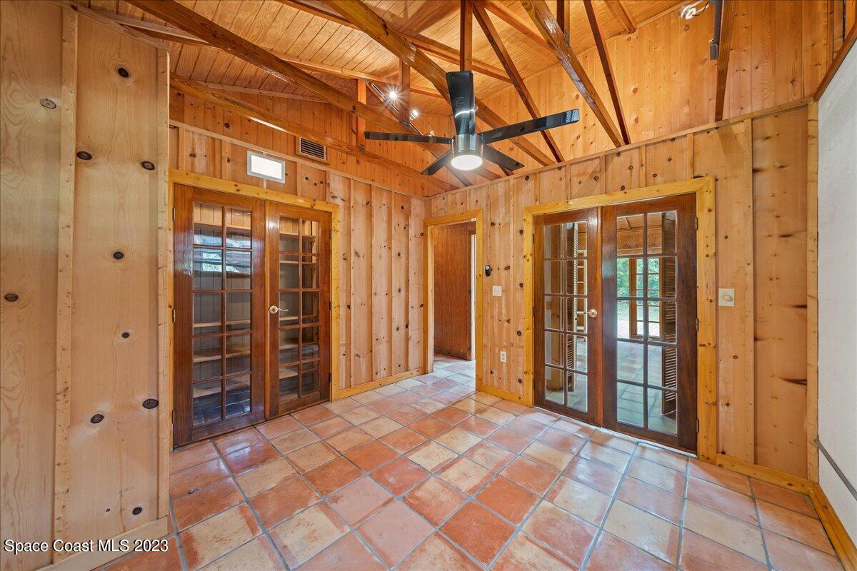 4885 Sand Point Road Grant, FL 32949 - Photo 19 of 36 a view of a bathroom with a shower