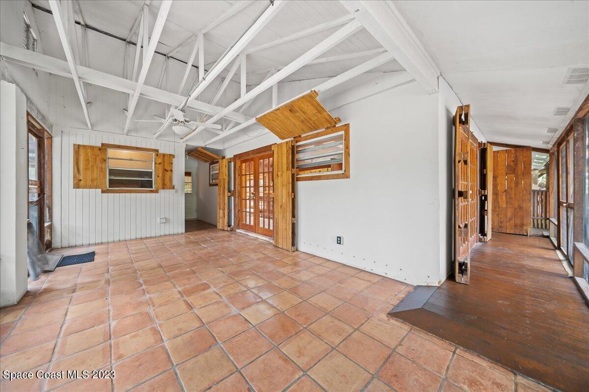 4885 Sand Point Road Grant, FL 32949 - Photo 25 of 36 a view of hallway with wooden floor