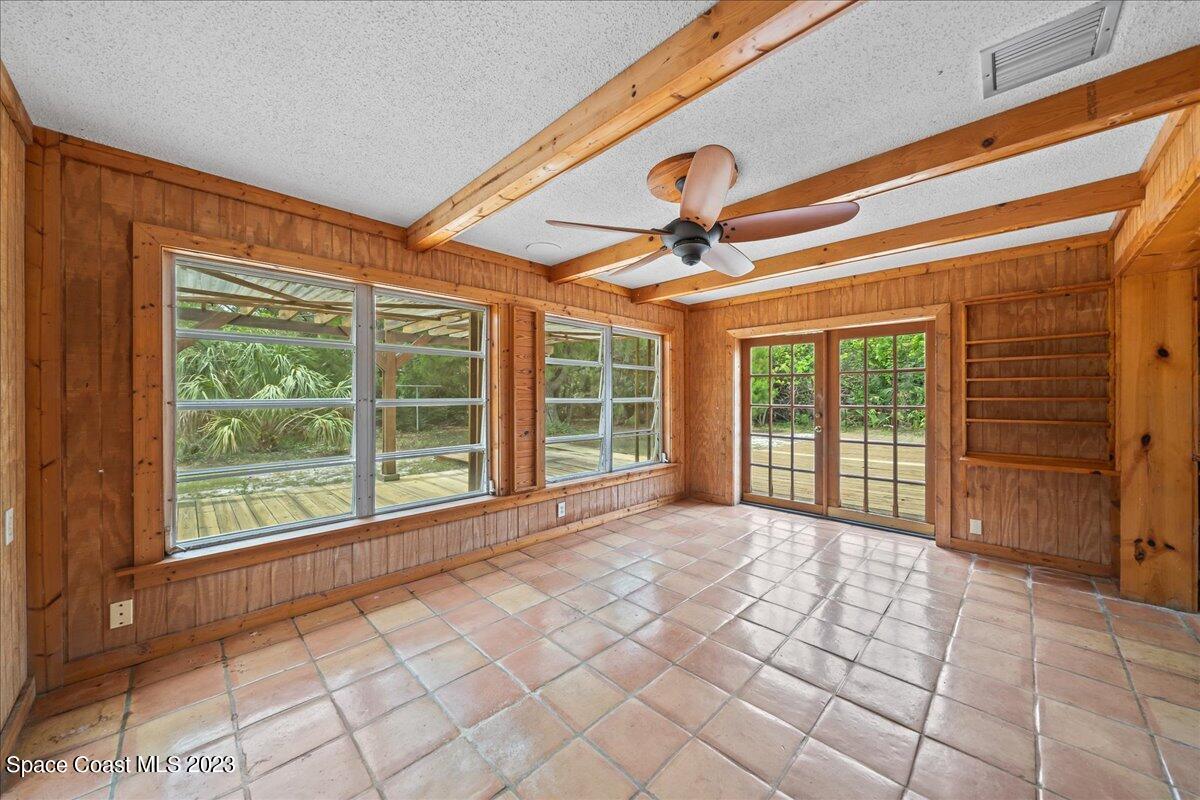 4885 Sand Point Road Grant, FL 32949 - Photo 27 of 36 a view of an empty room with a window