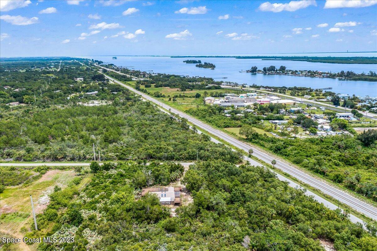 4885 Sand Point Road Grant, FL 32949 - Photo 3 of 36 a view of a large building