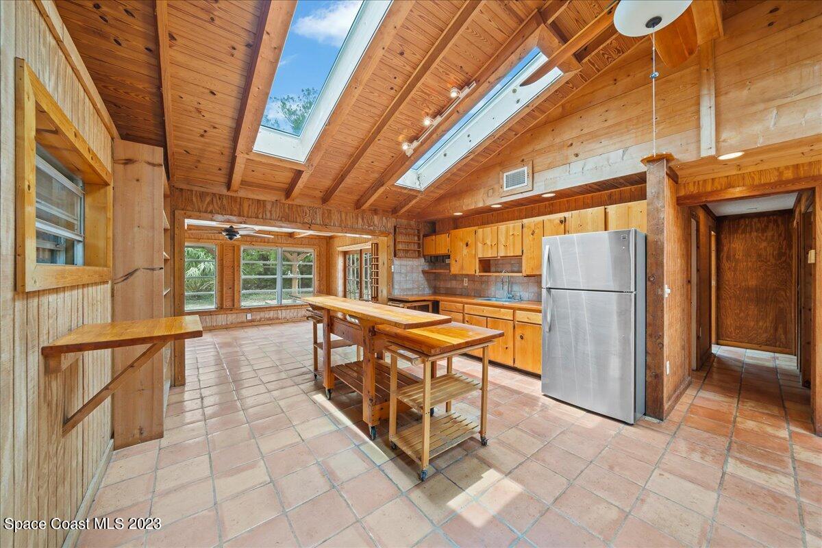 4885 Sand Point Road Grant, FL 32949 - Photo 33 of 36 a view of an chairs and table in the balcony
