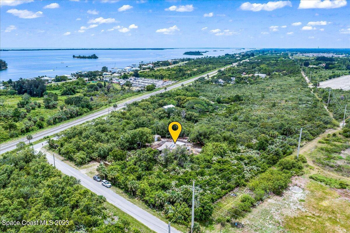4885 Sand Point Road Grant, FL 32949 - Photo 4 of 36 a view of a outdoor space and a swimming pool
