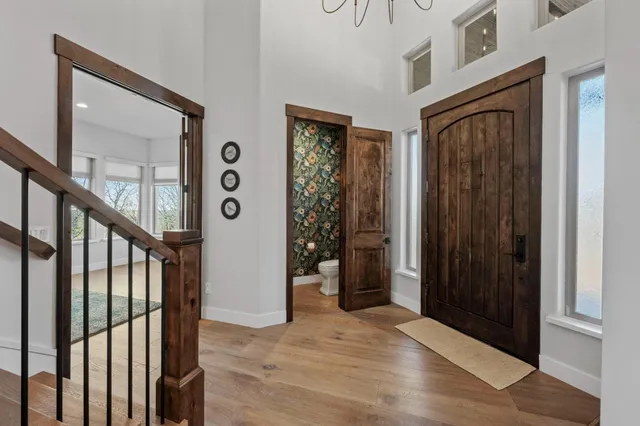 a view of a sink and table in a microwave
