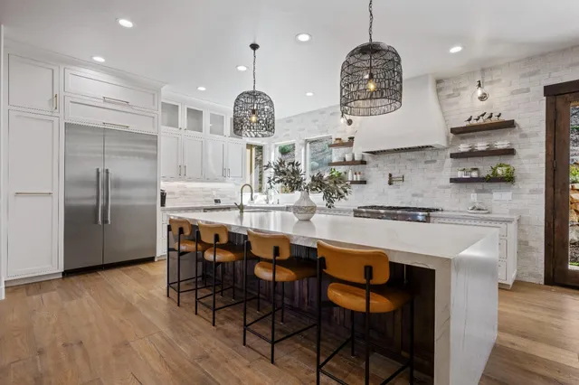 a backyard of a house with lots of green space